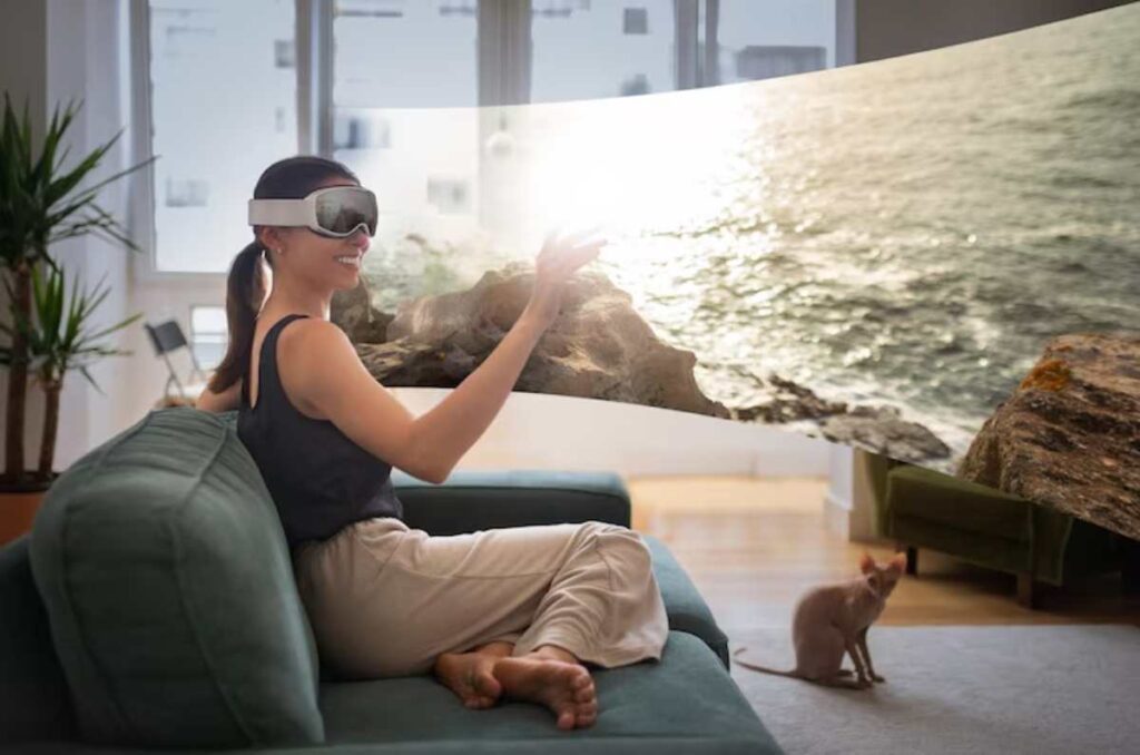 A person experiencing VR Travel of tranquil ocean scene through VR headset while seated on a couch.